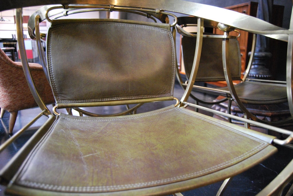 BRASS AND DARK GREEN LEATHER CHAIRS 1