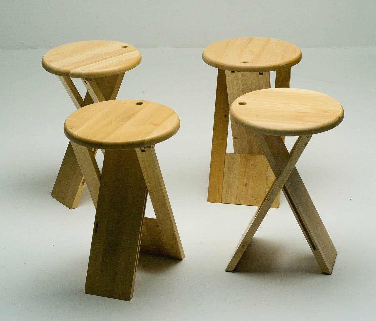 Roger Tallon beech 'TS' foldable stools or table, 1970s, made by Sentou, Paris.
Ingeniously designed to fold completely flat.
Competitive worldwide shipping available. Please ask for our in-house crating and shipping services.