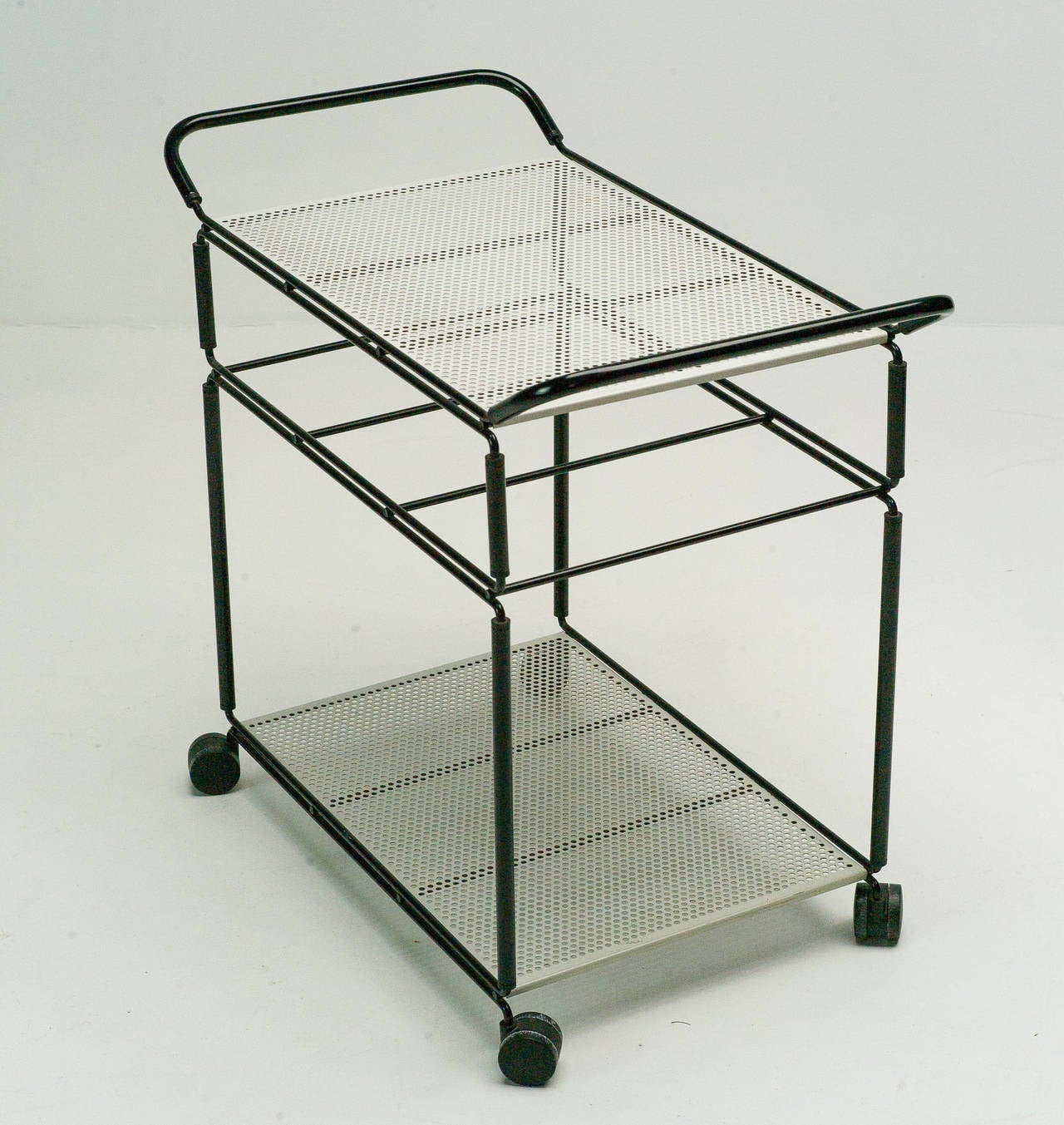 Dutch Industrial tea trolley, most likely made by Pilastro.
Competitive worldwide shipping available. Please ask for our in-house crating and shipping services.