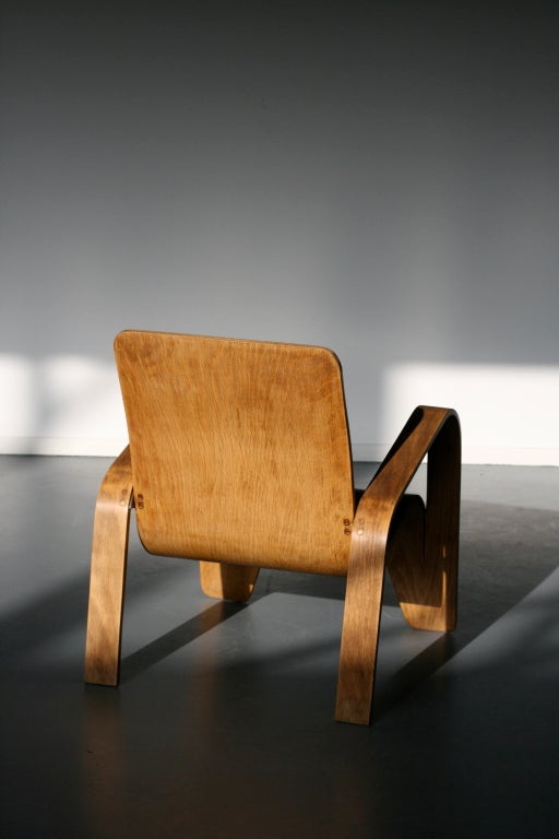 Han Pieck plywood armchair circa 1946, for Lawo, Ommen/Netherlands, manufactured from one piece of laminated plywood, copper nails.This from a total production run of approximately 1300 chairs.