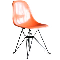 Charles Eames bright orange DSR chairs