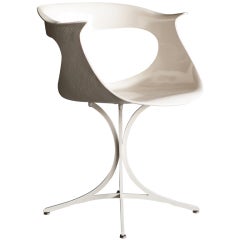Lotus chair designed in 1958 by Erwine & Estelle Laverne.