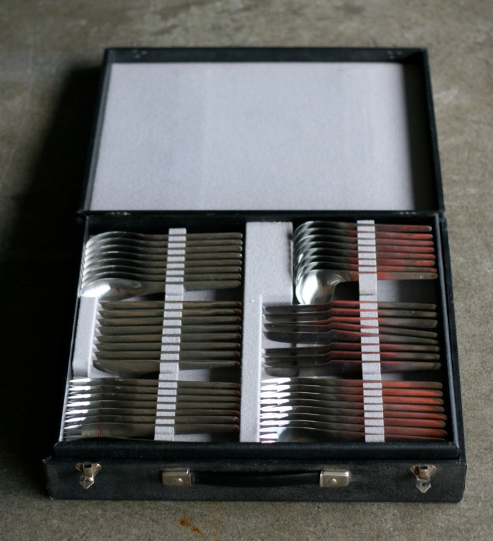 Complete Arne Jacobsen flatware set in original suitcase. 2