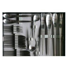 Complete Arne Jacobsen flatware set in original suitcase.