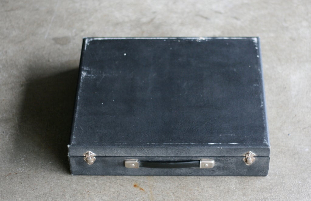 Complete Arne Jacobsen flatware set in original suitcase. 1