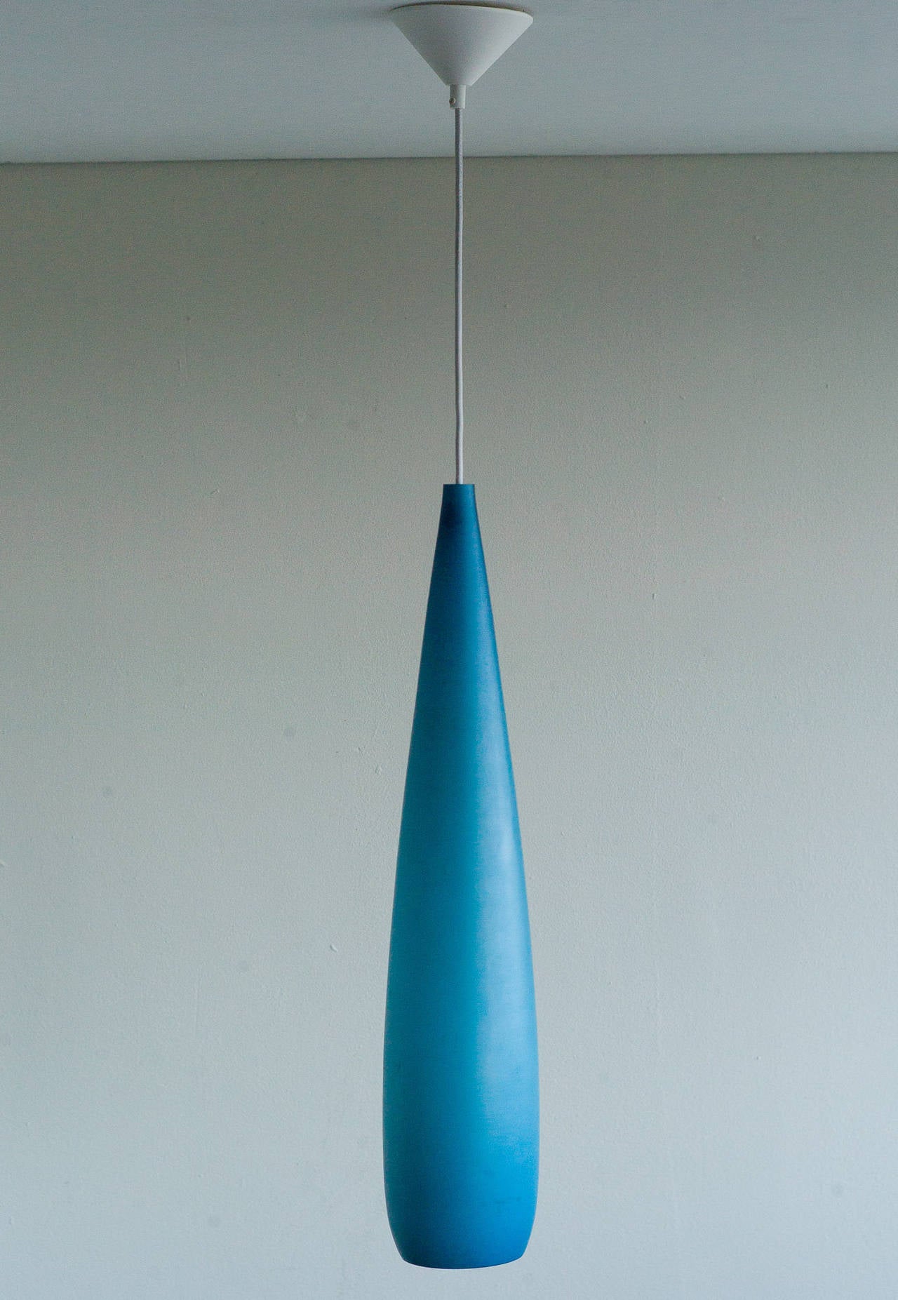 Very tall Holmegaard pendant, in beautiful matte blue. 
Marked with Holmegaard label.