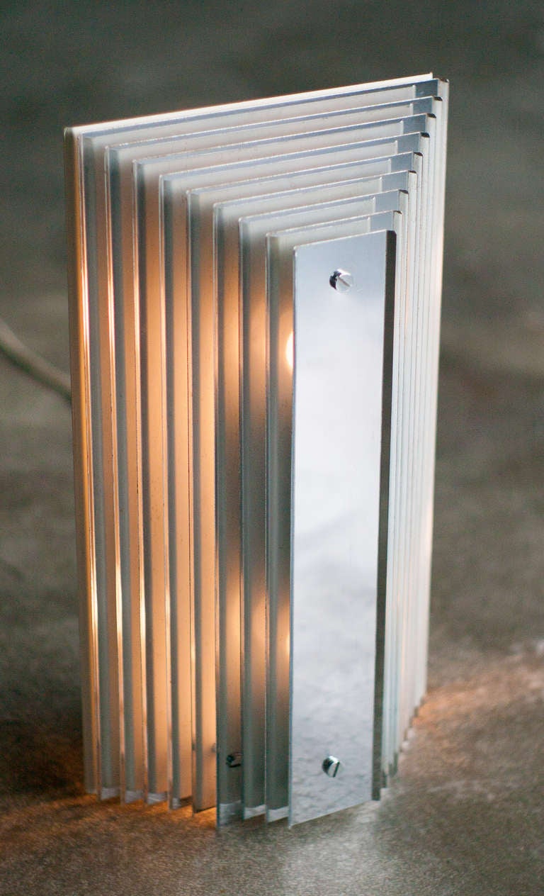 Very unusual lamp, reminiscent of the work of designers like Gianfranco Fini and Riccardo Meli for New Lamp.
Stamped 