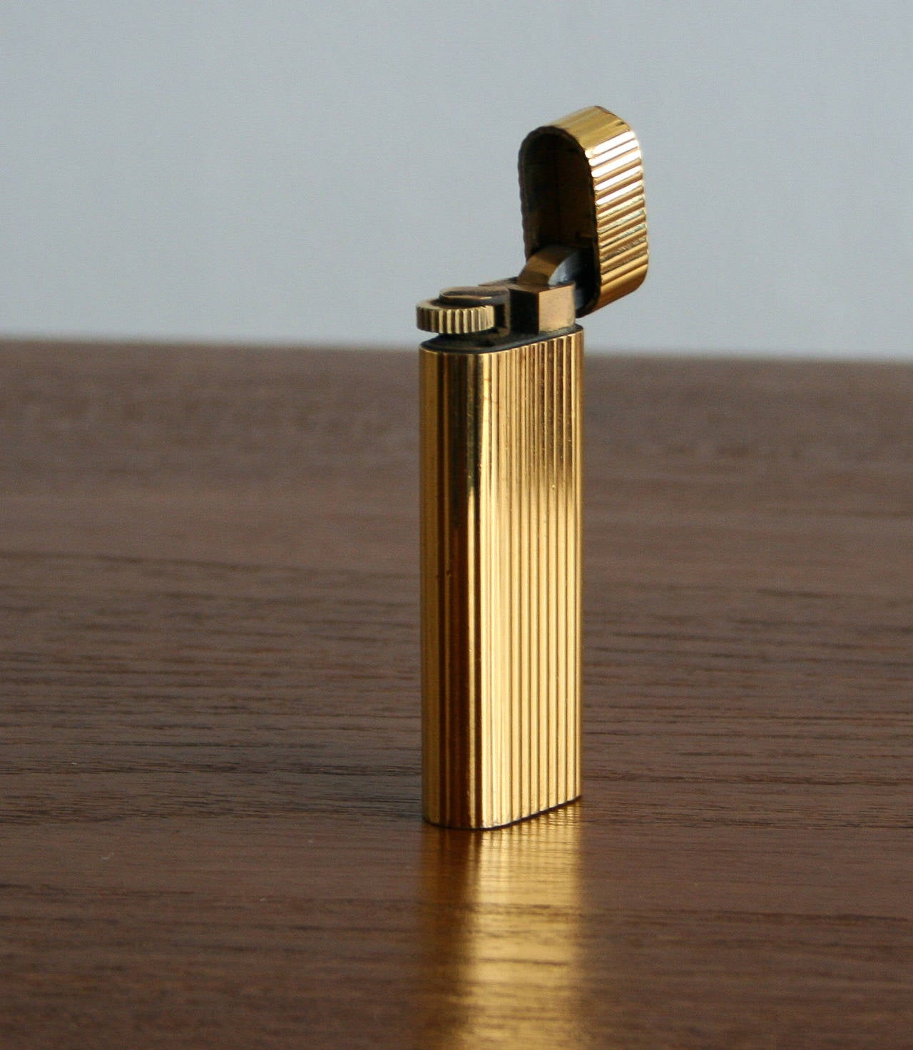 Authentic Cartier lighter.
Marked and numbered.
In the original box, and complete with warranty card and users manual.
We also have a matching ballpoint pen.
Free worldwide shipping with FedEx.
