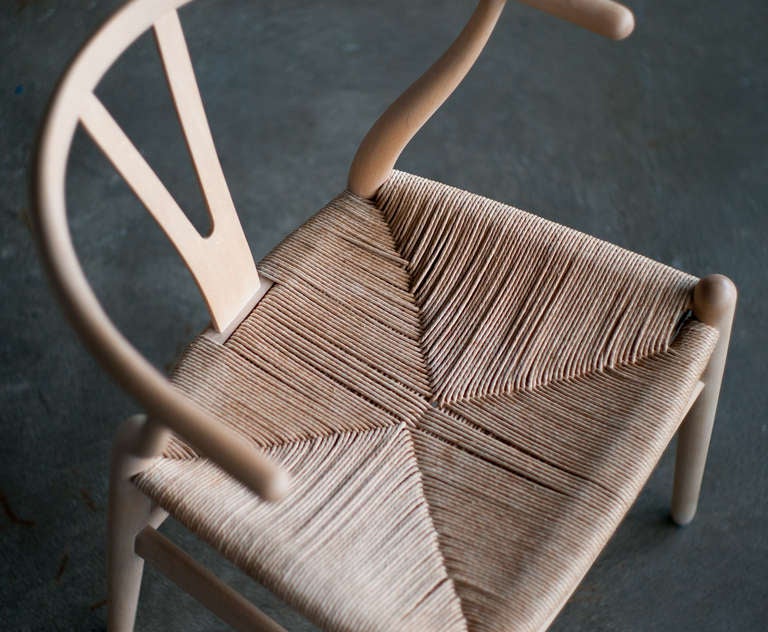 Danish Set of 6 Wishbone dining chairs in oak designed by Hans Wegner for Carl Hansen.