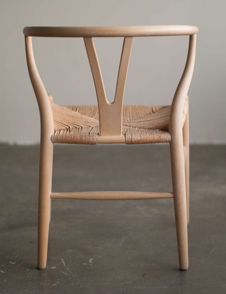 Oak Set of 6 Wishbone dining chairs in oak designed by Hans Wegner for Carl Hansen.