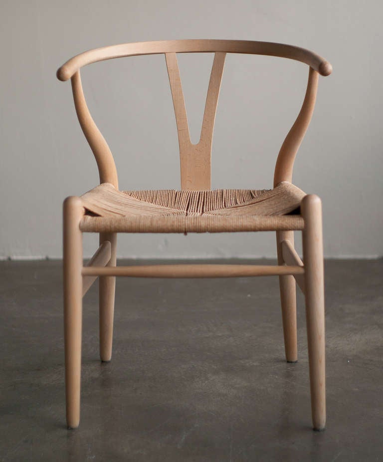 Set of 6 Wishbone dining chairs in oak designed by Hans Wegner for Carl Hansen. 1