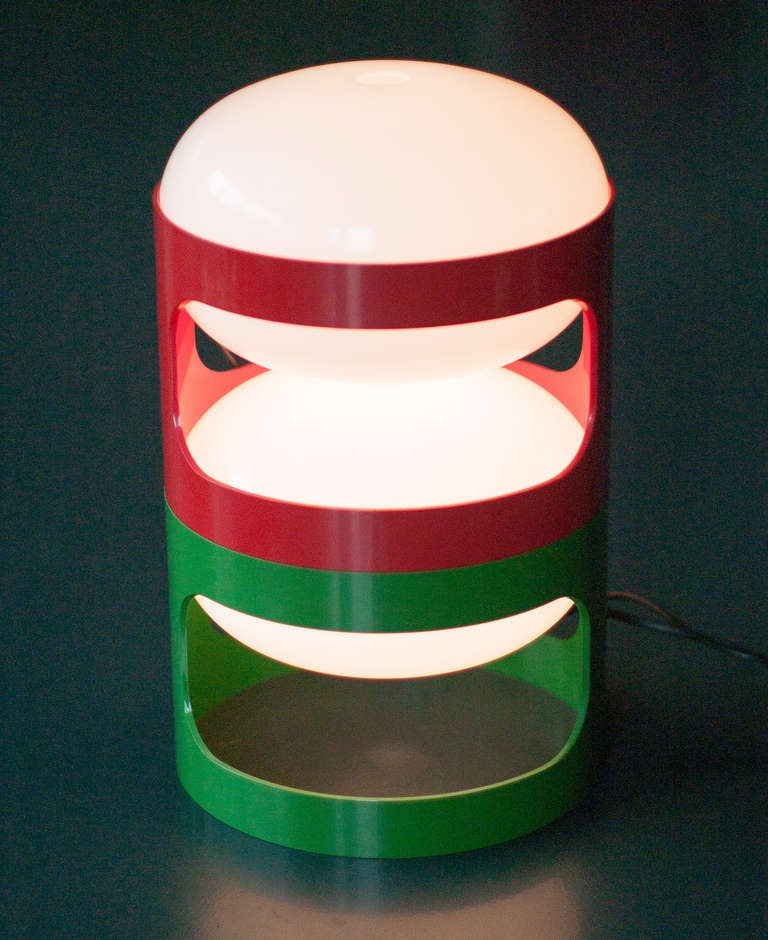 Great set of table lamps designed by Joe Colombo, in red and green. They are in perfect condition because they where purchased new by a collector and have been stored carefully in a box for many years.