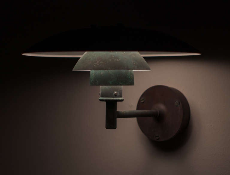 A set of 3 wonderfully patinated wall lamps in copper by Poul Henningsen. Designed for outdoor use, they can also be used for interior applications.
We offer museum quality crating and affordable worldwide shipping. Feel free to inquire!