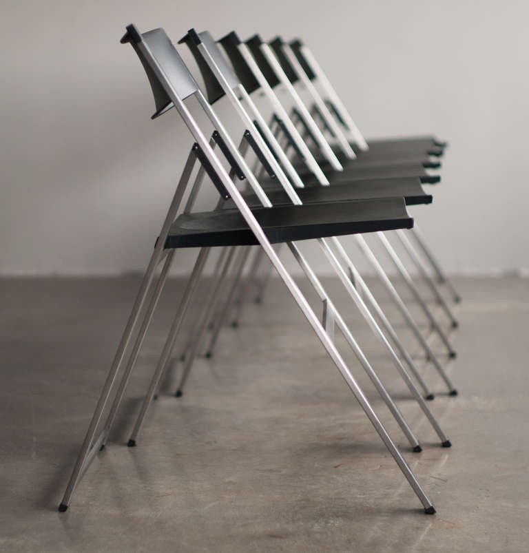 Contemporary folding chairs designed in 1991.
P08 by Justus Kolberg for Centro Progetti Tecno.
Renown for its clever way of folding.