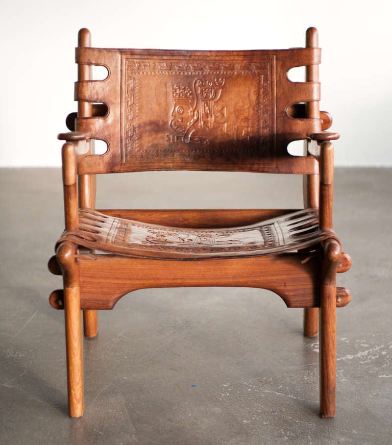 Stained 1960's Ecuadorian armchair with embossing