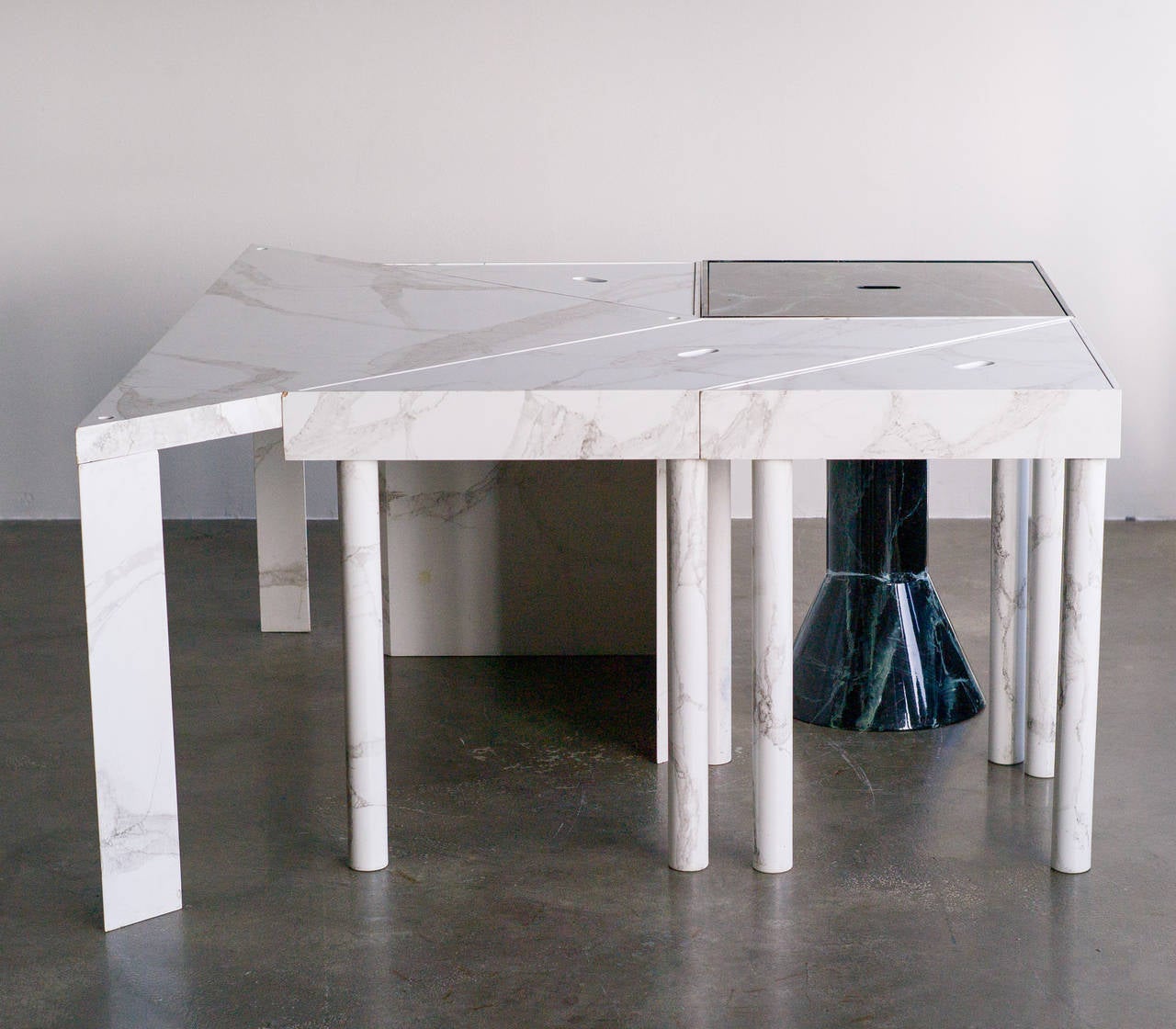 This highly unusual dining table is an example of 