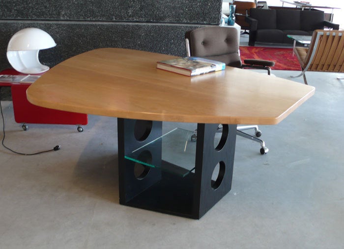 Ateliers Jean Prouve M23.
Freeform tabletop on this writing table-desk. 
Top in natural ash and base in black finished ash.
Glass shelf.
Manufactured by Tecta starting in the 1990's.