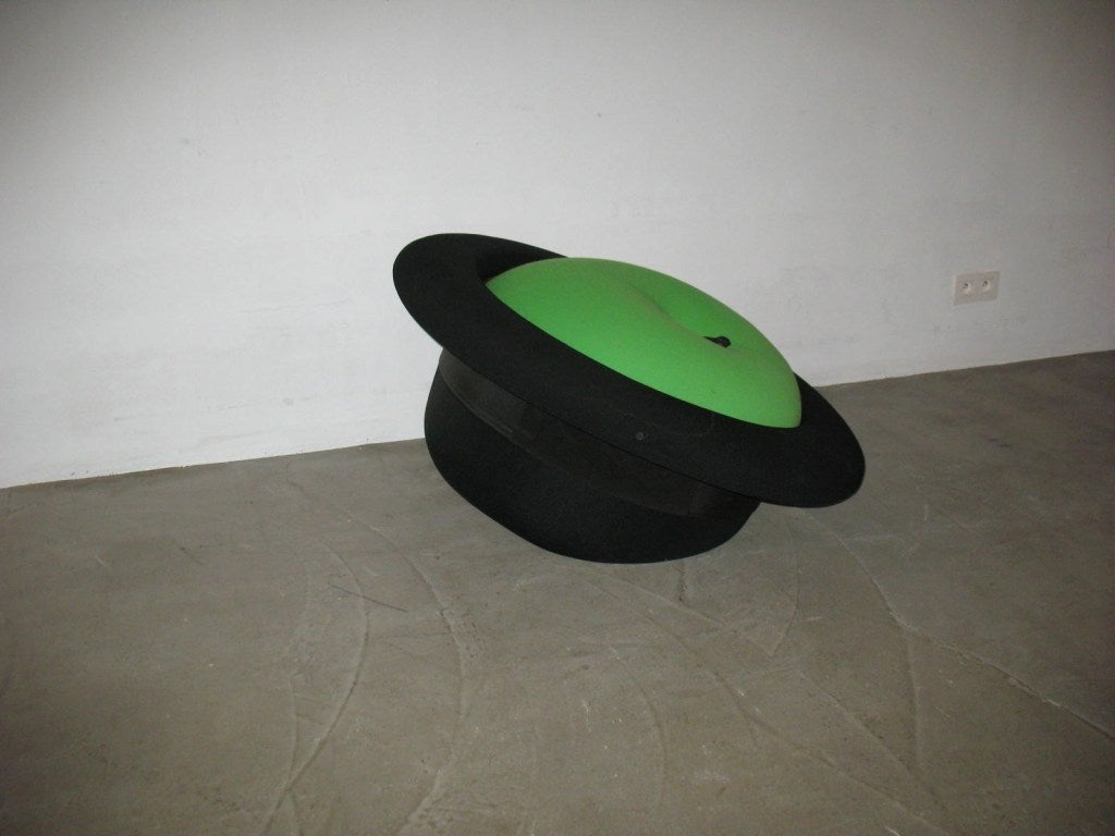 Chair in the form of an apple - stuffed bowler hat
