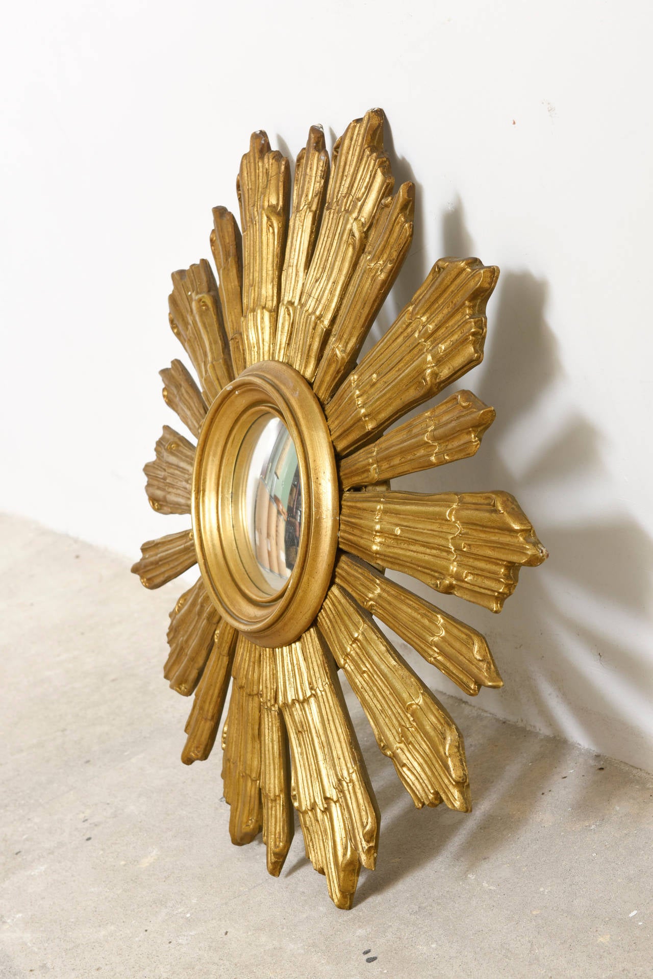 Beautiful Italian wooden gold gilt sunburst mirror.