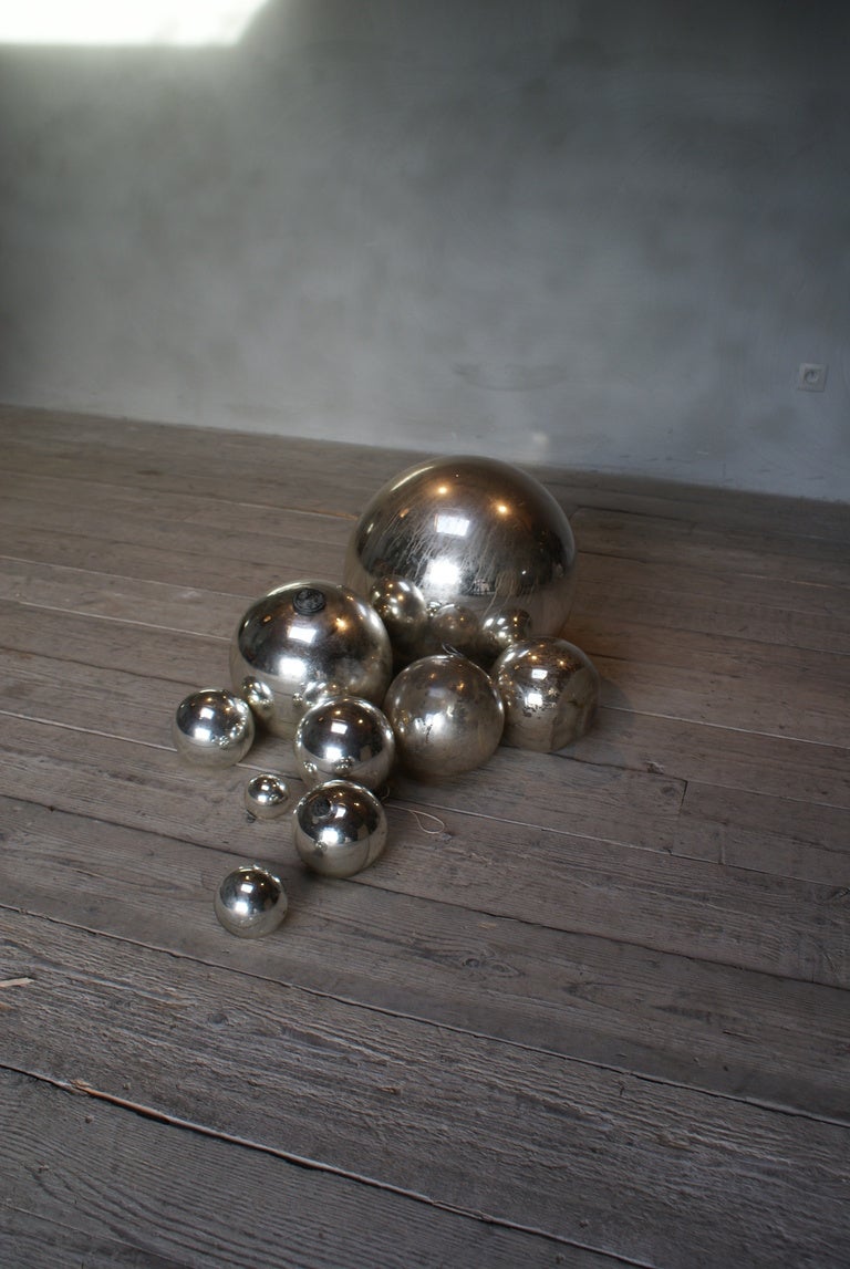 19th century mercury spheres, hand blown glass spheres with mercury insde, one extra large ball which we call it a witch ball, european dimensions: 41.5cm, 26cm, 2x 18.5cm, 15cm, 2x 13cm, 9cm, 6.7cm
