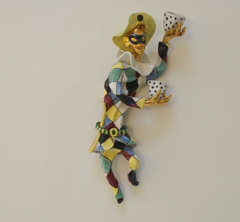 Rare 1950's hand painted harlequin sculpture with two lamps holding in it's hands.
There are no chips or cracks. The head can be removed for safe transport.
The backside is marked in hand painted: San Polo Venezia and a number. Then it has the
