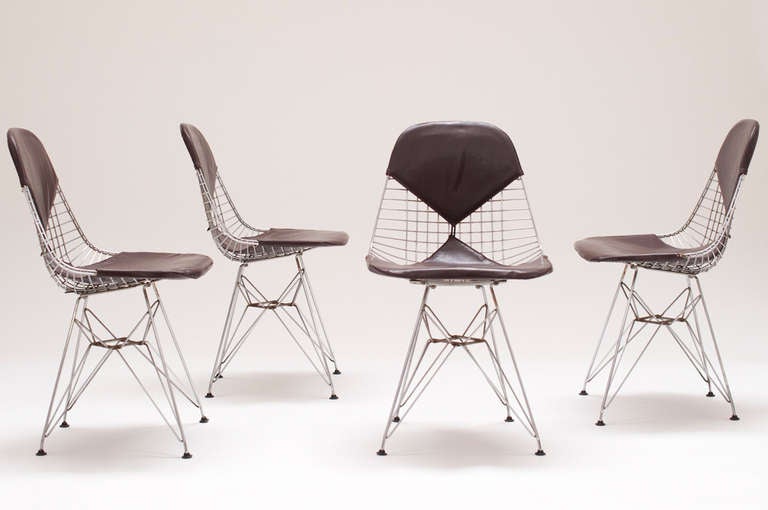 Great original set of wire chairs with their original chocolate brown bikini cushions. The chairs are all labelled with the herman miller sticker, stating that is is designed by George Nelson. This could point on the fact that these were earliest