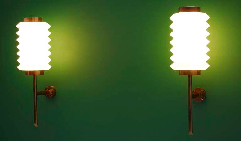 Rare pair of 1950's brass Arredoluce wall lamps by Angelo Lelli
