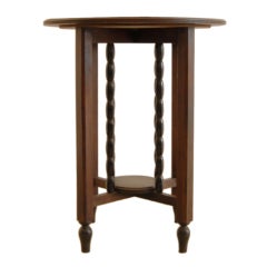 1920's oak Gueridon with sculpted ebonised base 2