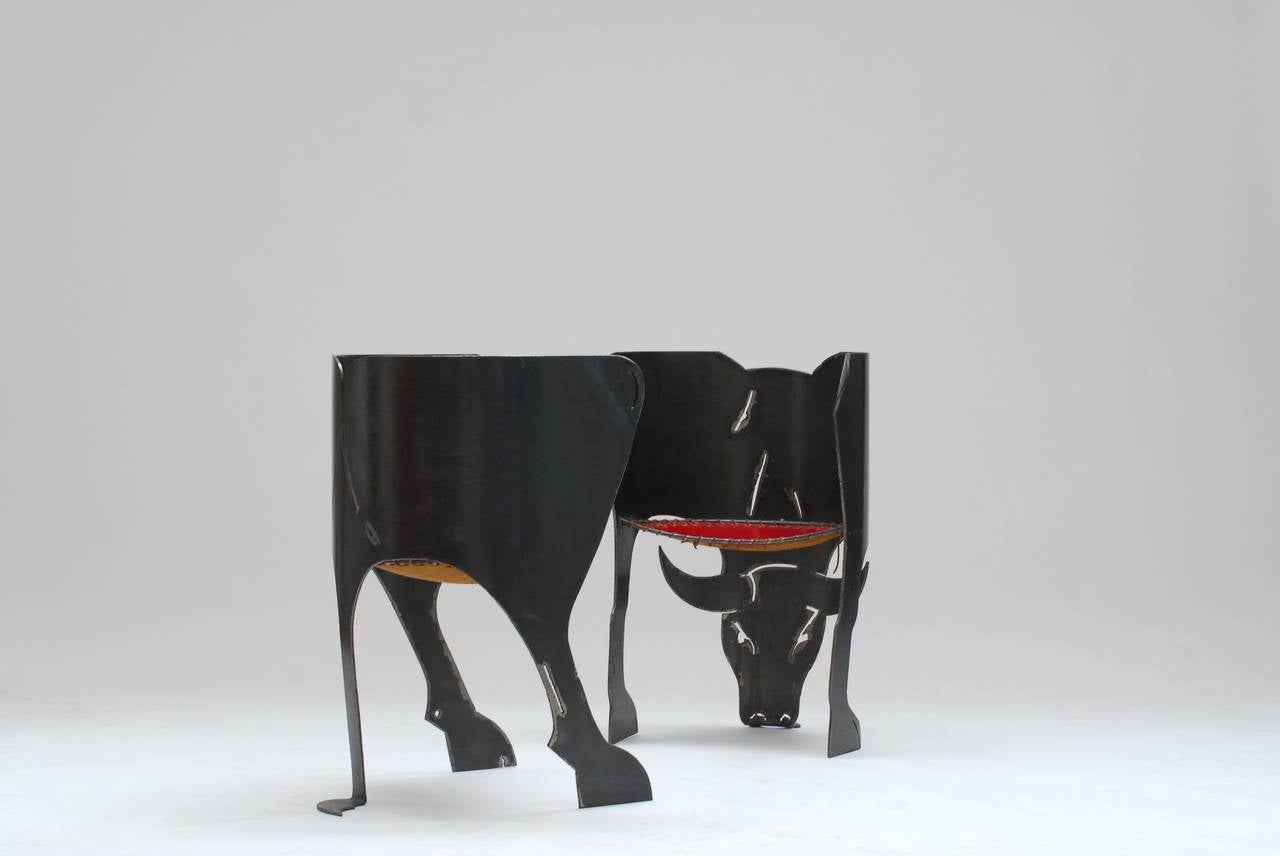 Very impressive handmade steel pair of armchairs in the shape of an Ox. Metal artist Gerold Sauter presented these chairs on an important show in 1988. More precisely at the DESIGN gallery in Berlin. Founded by Herbert Jacob Weinand.
The exposition