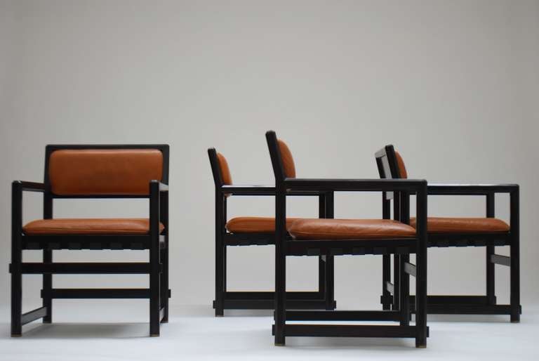 Very comfortable set of dining chairs which also can function as conference chairs. Orange / brown original leather in perfect condition.
They were originally designed by Edward Wormley. Jules Wabbes retrieved the license with his company Mobilier