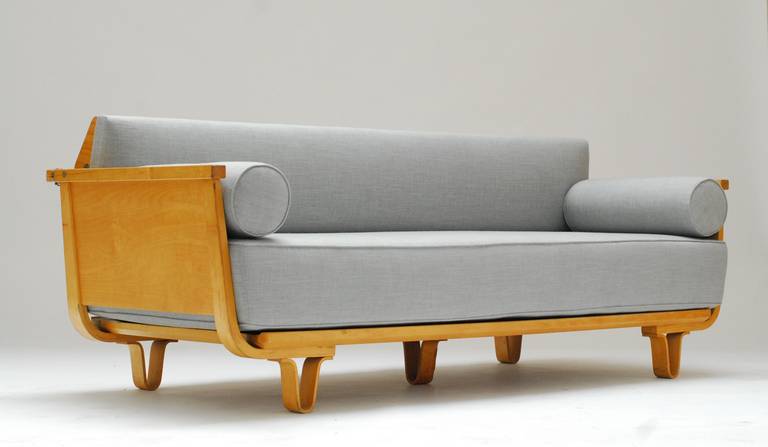 Superb, well preserved birch sofa by Cees Braakman for the Pastoe company around 1950. 
Cushions are totally renewed as also the foam ... The backrest swivels back when the sleeping or bed function is desired.