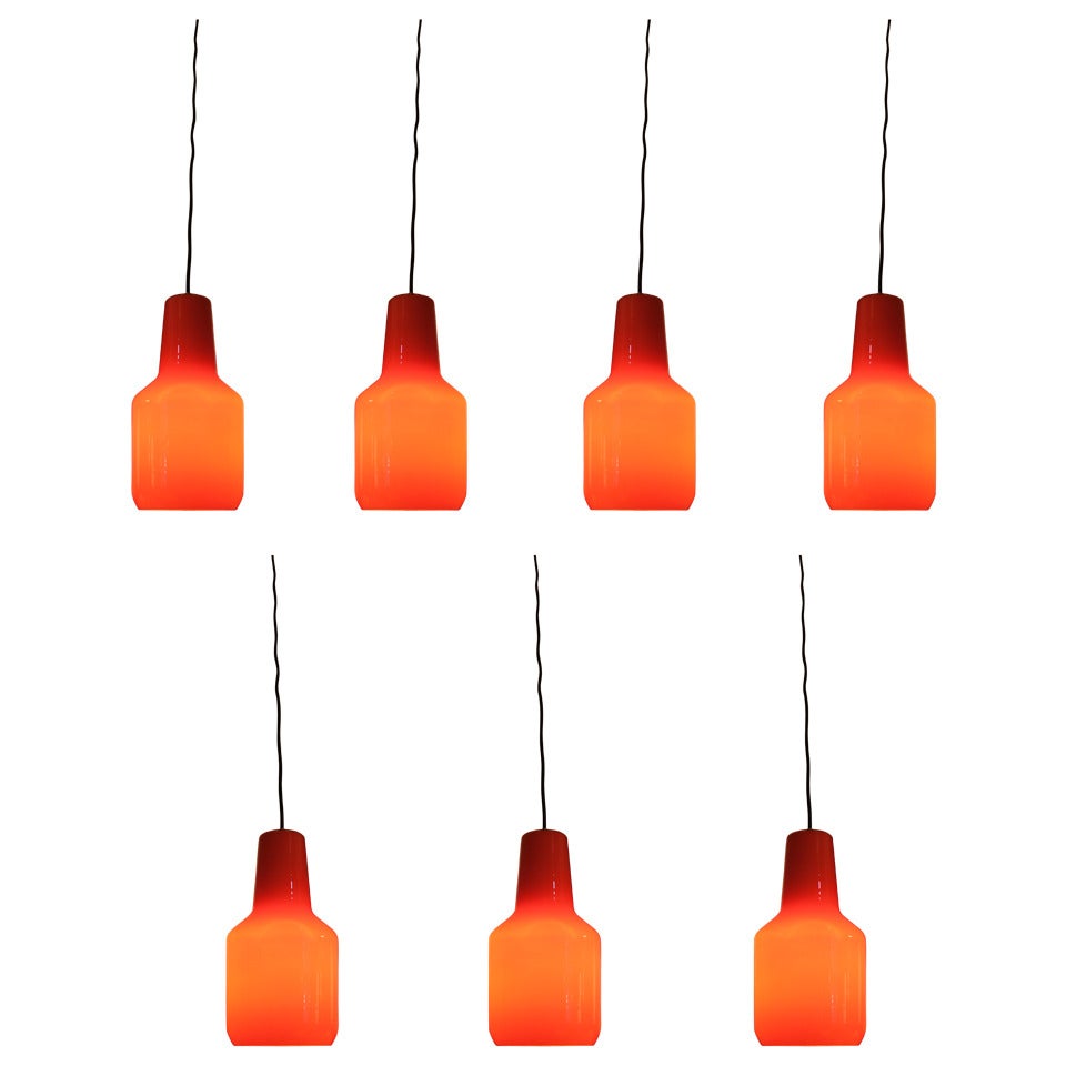 Seven Orange Venini Glass Pendant Lamps by Massimo Vignelli, Italy 1950