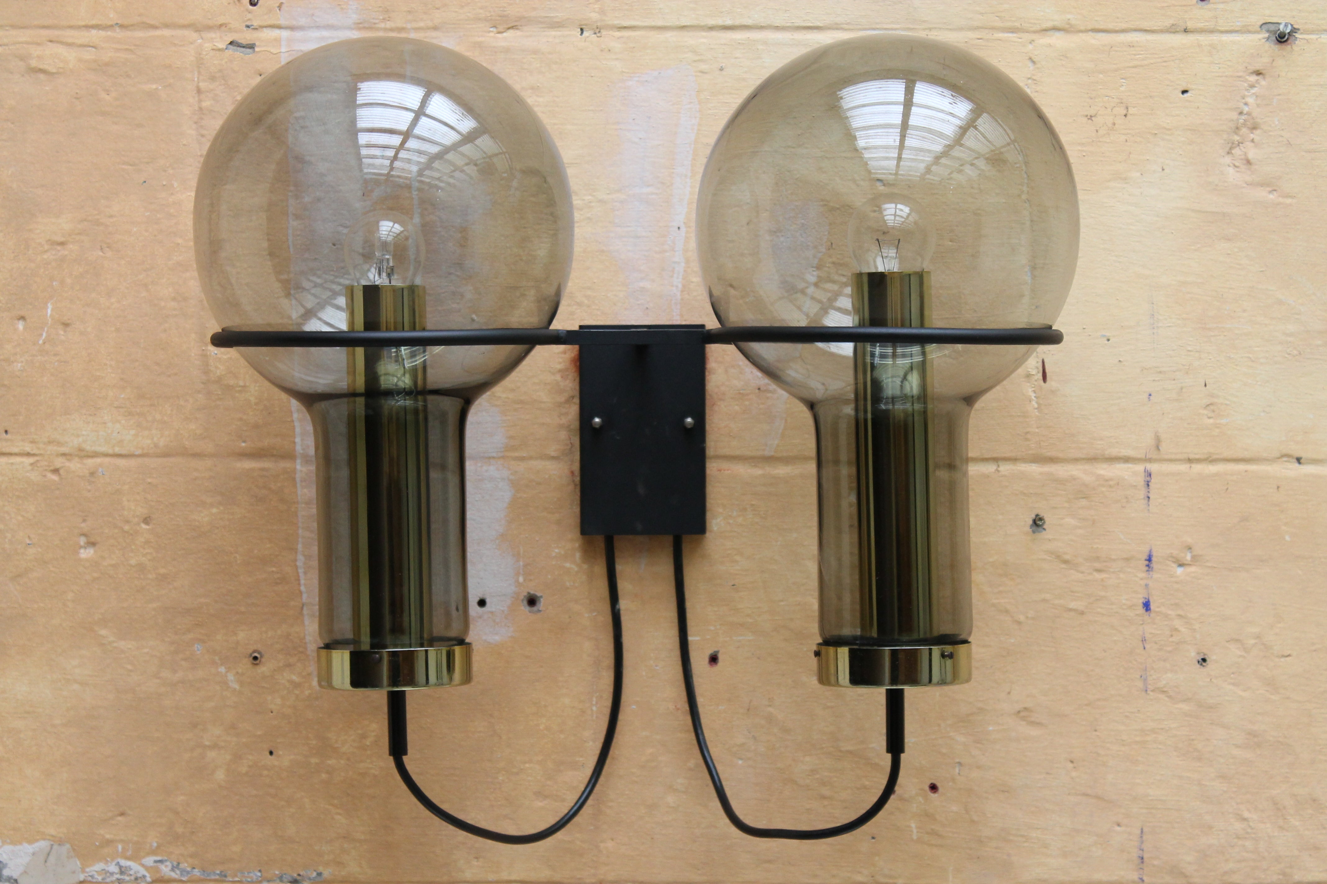 A rare  pair 2 maxi globe wall sconces by RAAK Amsterdam 1960's