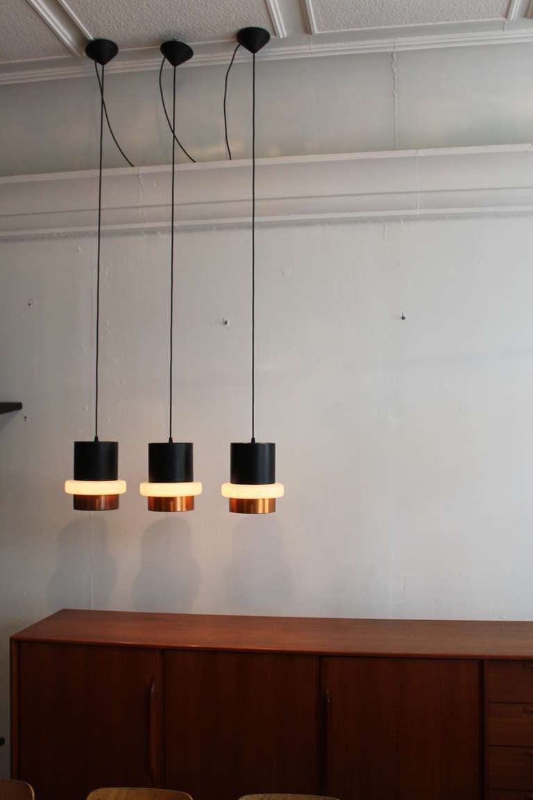 Mid-20th Century Three Stilnovo Pendant Lamps in Glass and Brass, Italy, 1950s