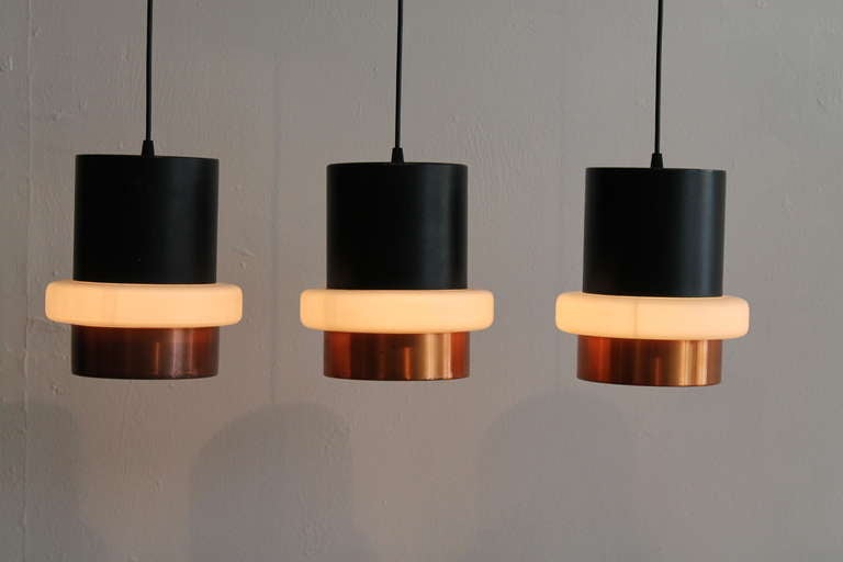 Metal Three Stilnovo Pendant Lamps in Glass and Brass, Italy, 1950s