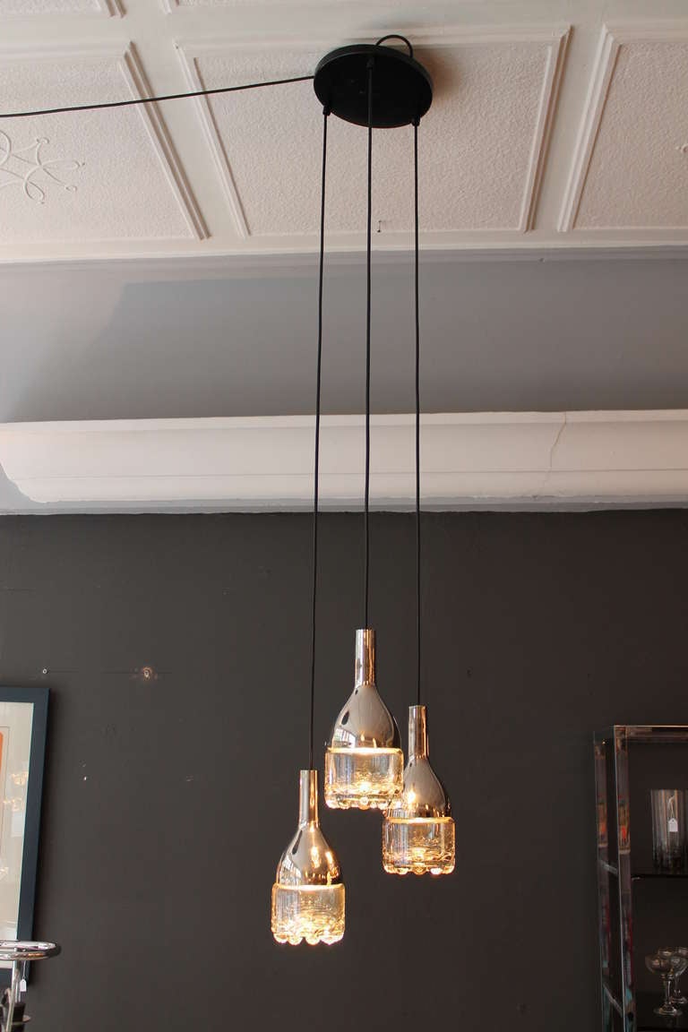 A Chique Chandelier, Silverplated Brass and Flowershaped Glass, 1950's In Excellent Condition In Antwerp, BE