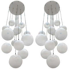 2  Impressive XXL Glass Balls Chandeliers by Raak 1960