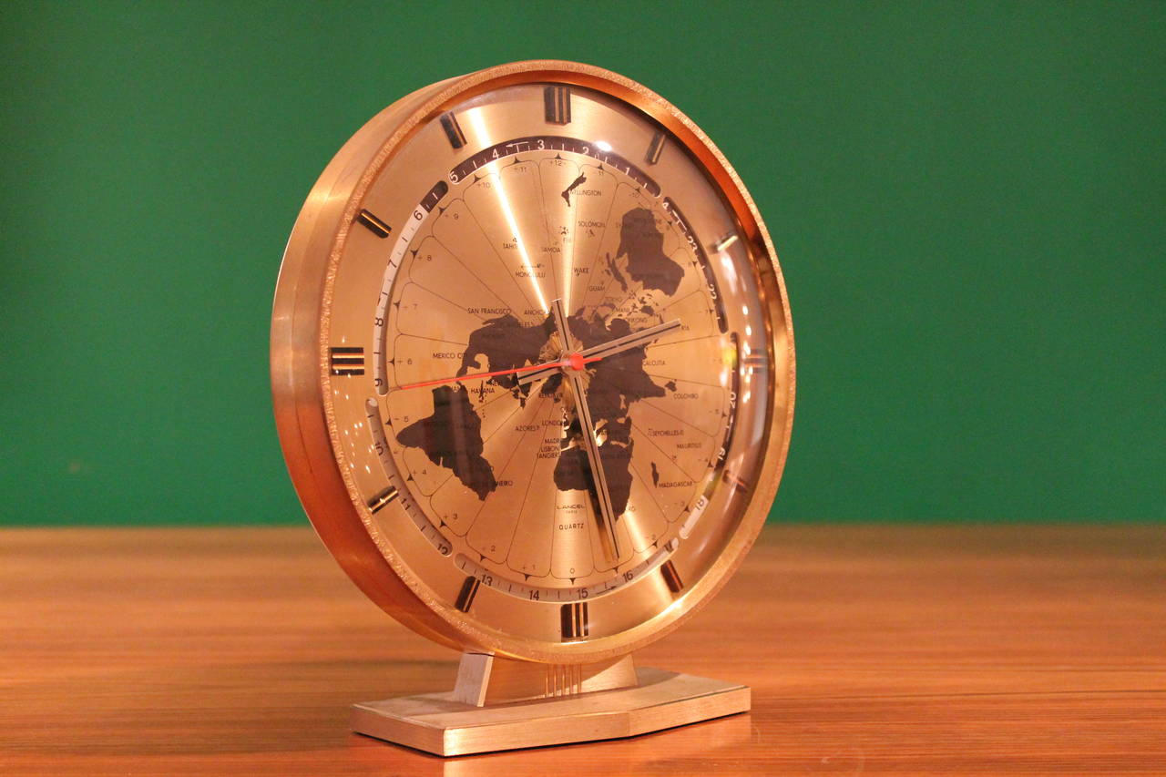 brass world desk clock  by Lancel Paris France  1960s 

good working condition