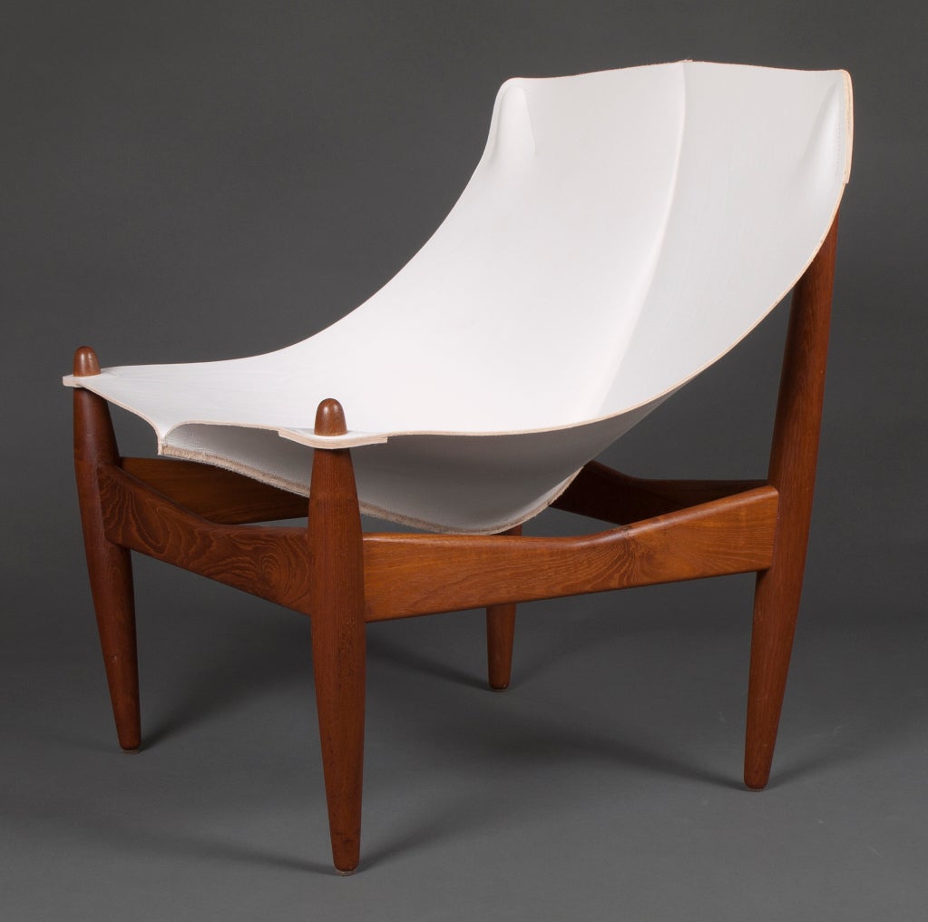 Danish Rare easy chair & ottoman by Illum Wikkelsø