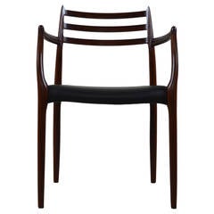 Rosewood and Black Leather Armchair by Niels O. Møller