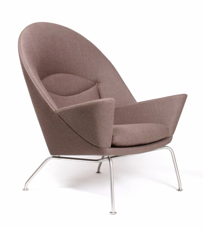 The Oculus Chair, designed by Hans Wegner in 1960 has never seen daylight until it was re-launched by Carl Hansen in 2010. This is one of the earliest chairs from this re-edition. 
Only two prototypes of the original model 'AP68' were ever