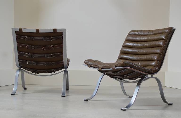 Beautiful pair of 'Ariet' lounge chairs by Swedish designer Arne Norell, designed in 1966, in a rich, thick and lovely patinated Buffalo leather. 
These smaller versions of Arne Norell's 'Ari' lounge chair are very comfortable and much more rarely