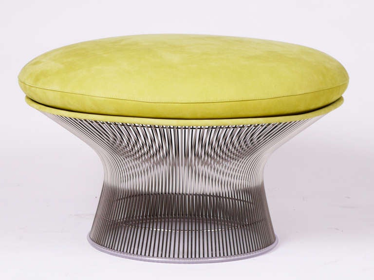 Nickel finished steel rods with upholstery in an extraordinary and custom order Acid yellow Suede by 'Spinneybeck'. 
Matching tall lounge chair also available. Check our inventory.
