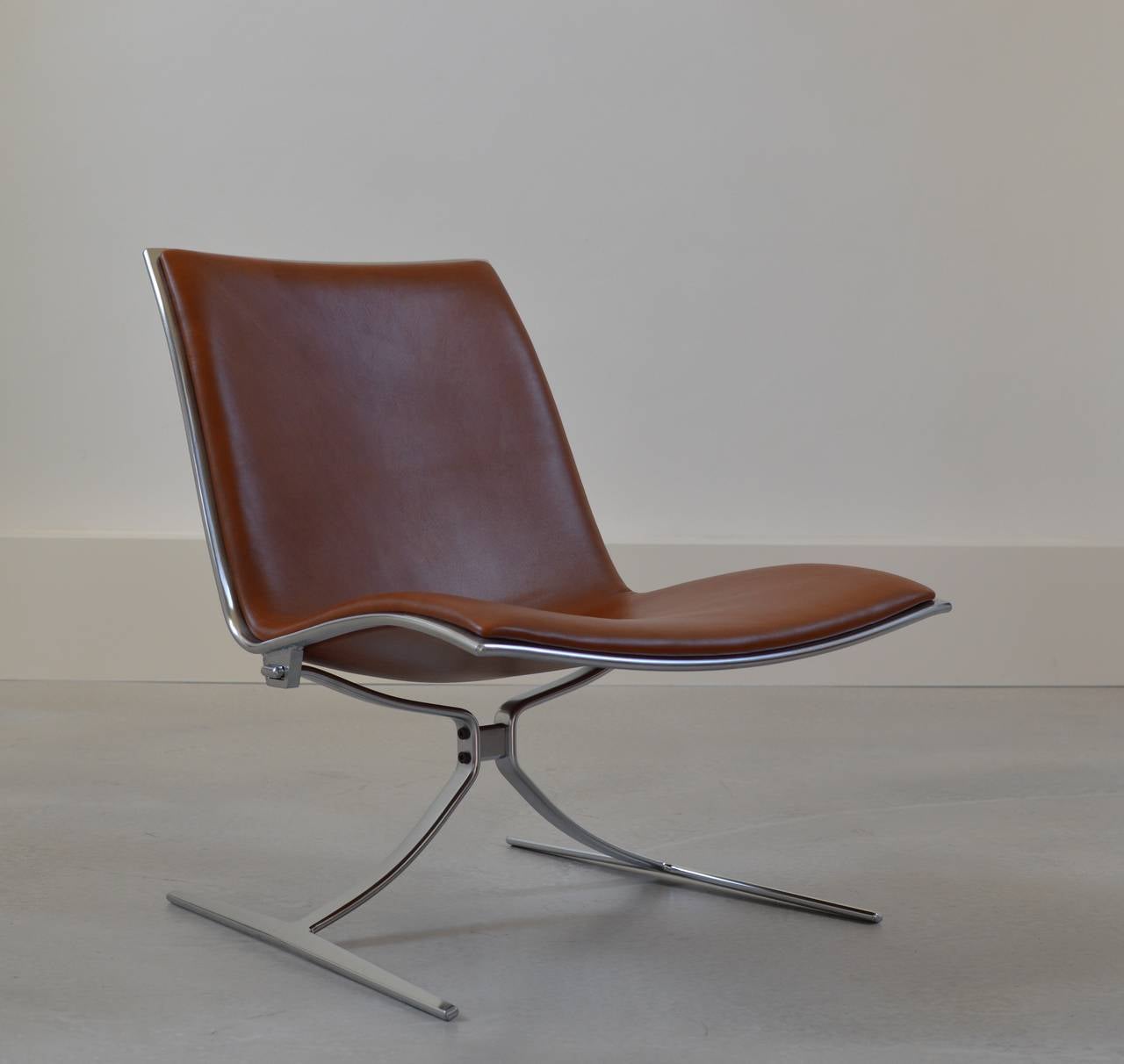 Originally designed in 1968 and produced in limited numbers by Alfred Kill (Germany) this chair is from the currently manufacturer 'Lange Production' who uses the original tools from the 1960s for the present production. 
Chair is in perfect