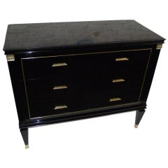 Black ebonized chest with bronze details