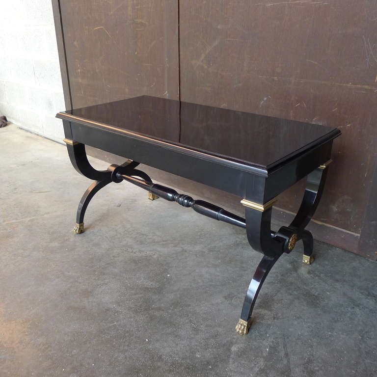 black ebonized coffee table with bronze details