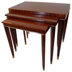 A Fine Mahogany Decoene Nest of Tables with Bronze Details