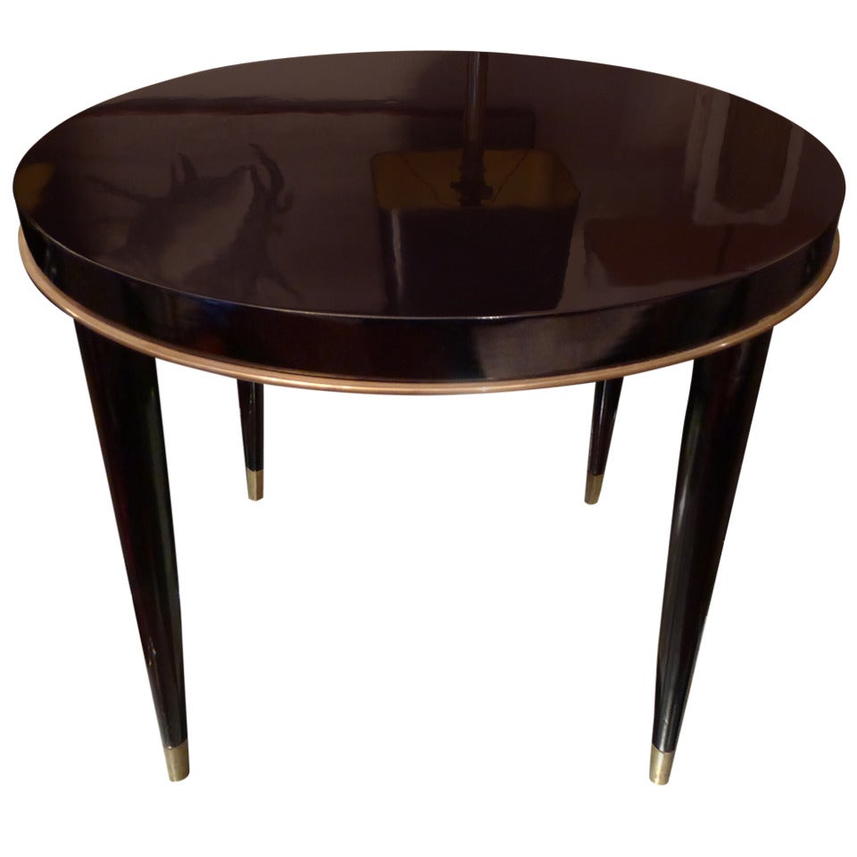 a fine Decoene round coffee table