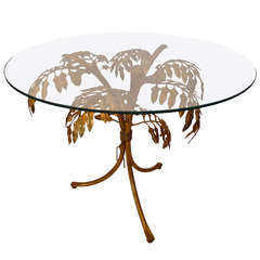 A Gilded Iron Coffee Table with Leaves 