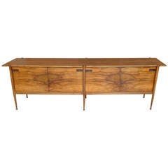 A large walnut sideboard with wenge details